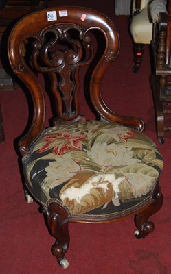 Lot 1338 - An early Victorian mahogany balloon back and...