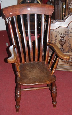Lot 1341 - An early 20th century elm and beech slatback...