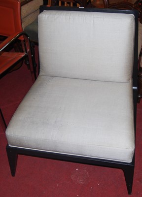Lot 1342 - A contemporary ebonsied and upholstered easy...