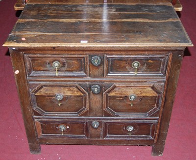 Lot 1346 - An antique joined and geometric moulded oak...