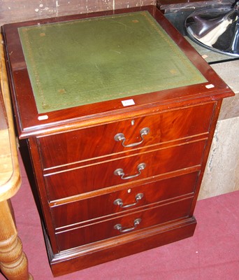 Lot 1355 - A contemporary mahogany and gilt tooled green...