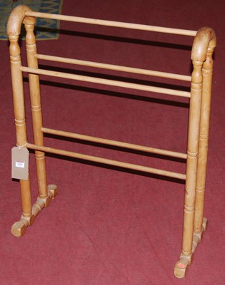 Lot 1356 - A turned pine towel rail, w.65cm