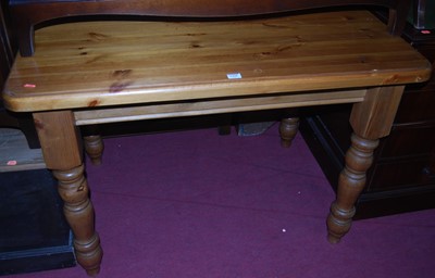 Lot 1358 - A modern pine round cornered kitchen table,...