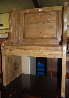 Lot 1359 - A contemporary stained pine single seat pew, w....