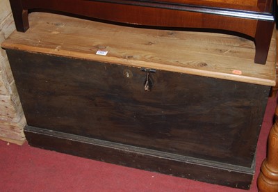 Lot 1360 - A stained pine plank topped hinged tool chest,...