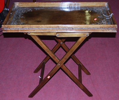 Lot 1371 - An Eastern floral relief carved teak tray-top...