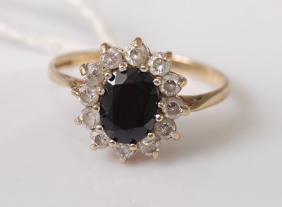Lot 351 - A lady's 9ct gold, blue and white sapphire set...