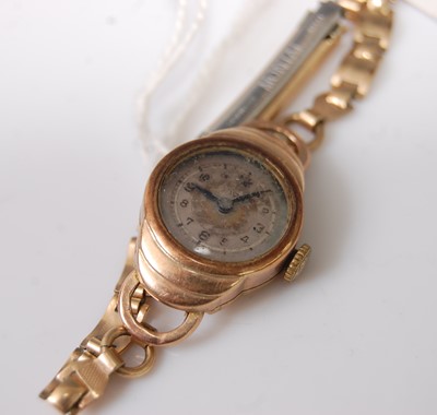 Lot 371 - A lady's 9ct gold cased manual wind wristwatch,...