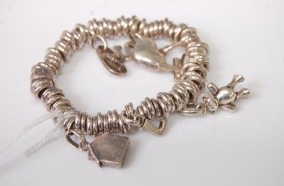 Lot 395 - A Links of London white metal bracelet set...