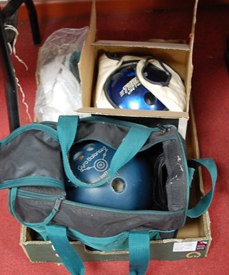 Lot 89 - Two ten-pin bowling balls; together with a...