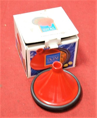 Lot 133 - A Le Creuset orange glazed earthenware tagine...