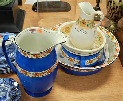Lot 159 - An early 20th century wash jug and bowl with...