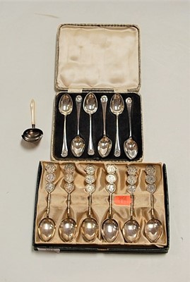 Lot 305 - A set of six white metal spoons, each having a...