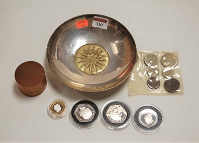 Lot 310 - A small silver plated shallow bowl, containing...