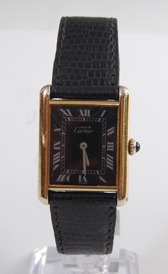Lot 1245 - A silver gilt cased Must de Cartier tank...