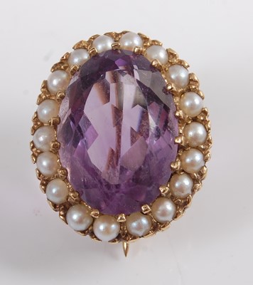 Lot 1209 - A 9ct yellow gold, amethyst and seed pearl...