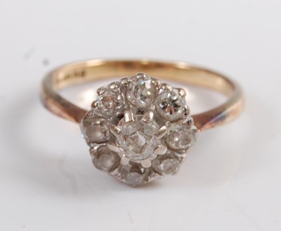 Lot 1260 - An 18ct yellow and white gold diamond...
