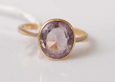 Lot 360 - A 9ct yellow gold oval amethyst dress ring,...