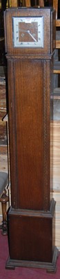 Lot 1365 - A 1930s oak Grandmother clock