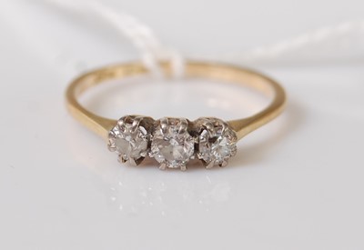 Lot 364 - An 18ct gold and platinum diamond three-stone...