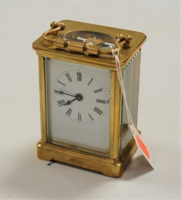 Lot 513 - A lacquered brass cased carriage clock, having...