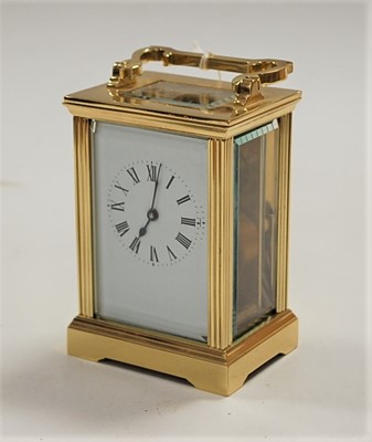 Lot 515 - A lacquered brass cased carriage clock, having...