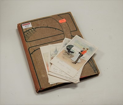Lot 533 - An early 20th century postcard album and...