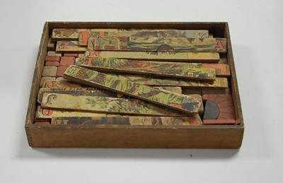 Lot 540 - An early 20th century building block alphabet set