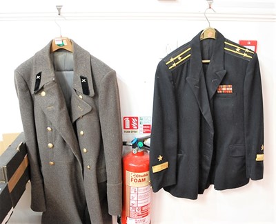 Lot 579 - A Russian naval overcoat; together with a...