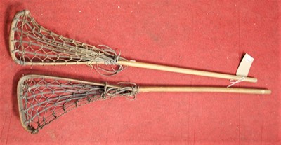 Lot 599 - Two lacrosse sticks