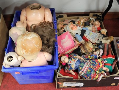Lot 606 - Two boxes of miscellaneous dolls, souvenir...