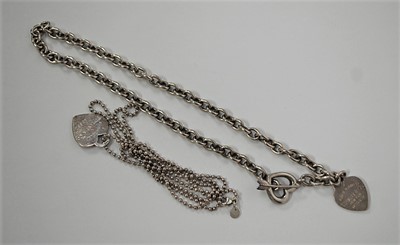 Lot 419 - A Tiffany & Co STYLE white metal identity...