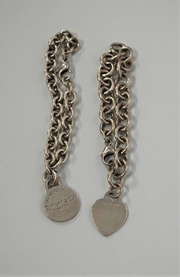 Lot 420 - A Tiffany & Co 925 silver identity bracelet;...