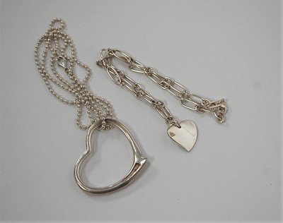 Lot 424 - A Tiffany & Co 925 silver chainlink identity...