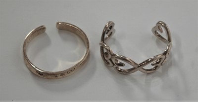 Lot 431 - A Tiffany & Co 925 STYLE silver bangle; and...