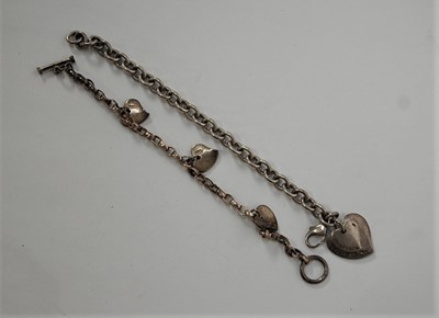 Lot 433 - A Tiffany & Co 925 silver chainlink identity...