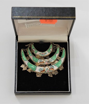 Lot 441 - A Persian white metal and enamel decorated...