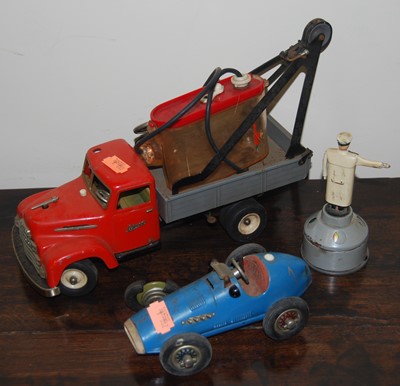 Lot 1512 - A collection of tinplate vehicles and...