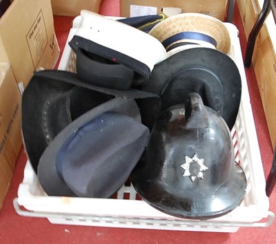 Lot 577 - A box of miscellaneous hats, to include mortar...
