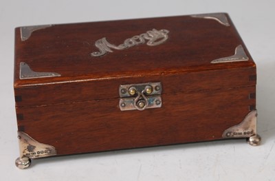 Lot 113 - An Art Deco mahogany and silver mounted...