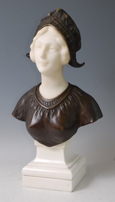 Lot 218 - A French Art Deco bronze and carved white...