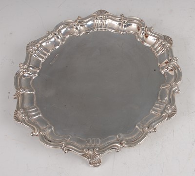 Lot 1104 - A Walker & Hall silver card waiter, having a...