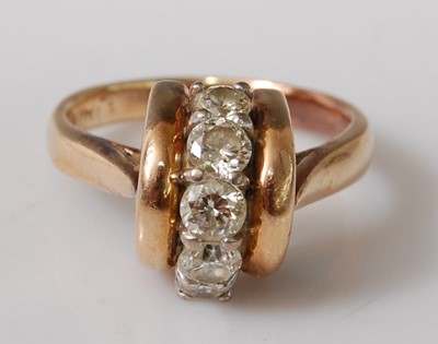 Lot 2504 - A yellow metal diamond five-stone ring, the...