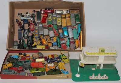 Lot 1610 - A Corgi Toys No. 54 MF50B tractor with shovel...