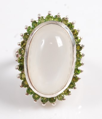 Lot 2573 - A white metal, moonstone and diopside oval...