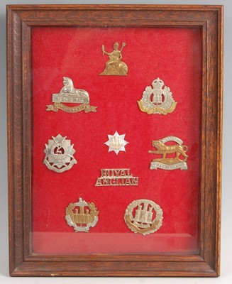 Lot 89 - A collection of Infantry Regiment cap badges to include