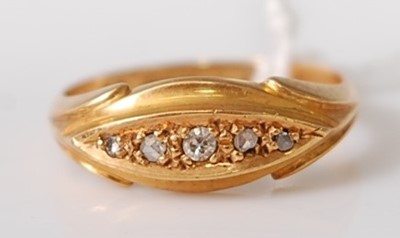 Lot 308 - An 18ct yellow gold diamond dress ring, the...
