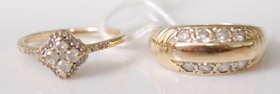 Lot 310 - A 9ct yellow gold marquise shaped diamond...