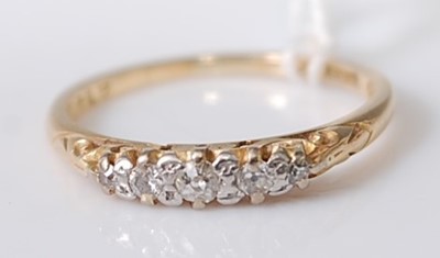 Lot 311 - A yellow metal diamond five-stone half hoop...