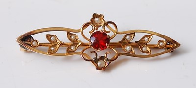 Lot 2569 - A yellow metal bar brooch, featuring a centre...